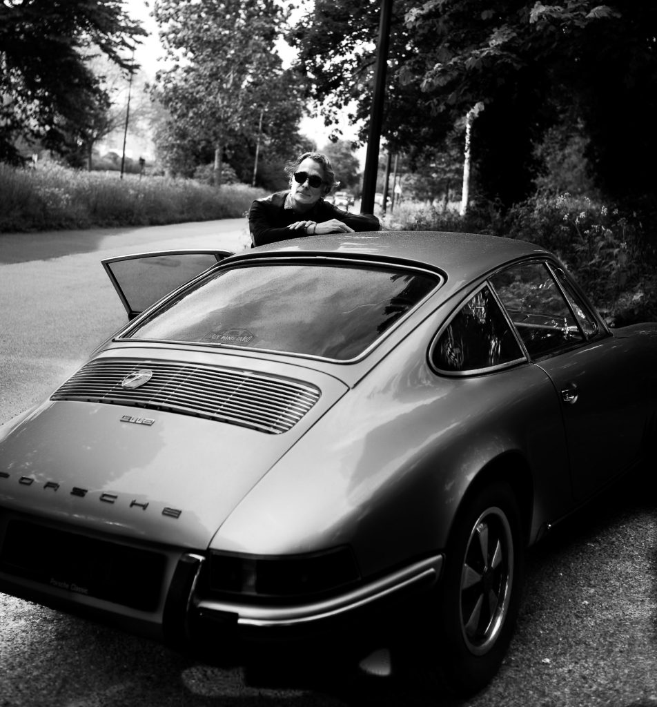 Porsche car with man