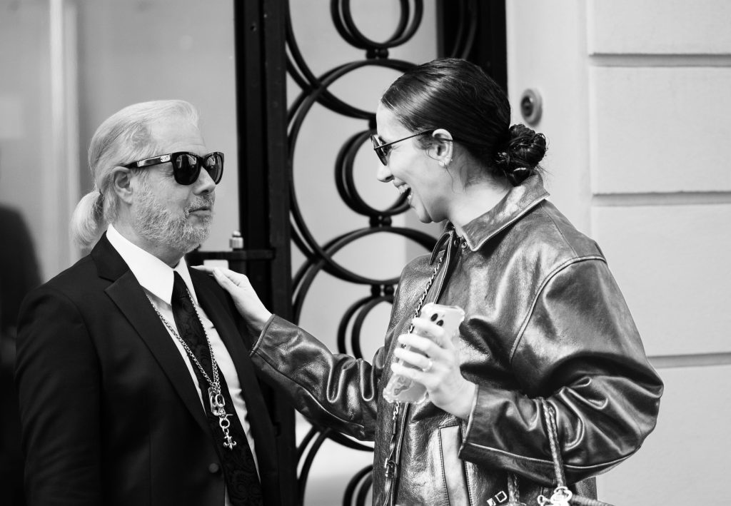 karl lagerfeld's lookalike with girl